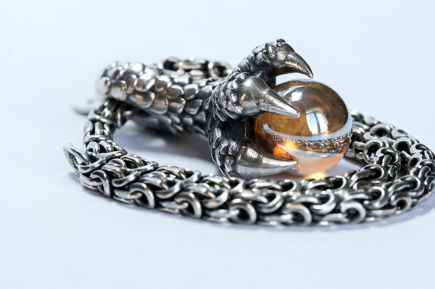 Dragon Claw with Glass Pendant