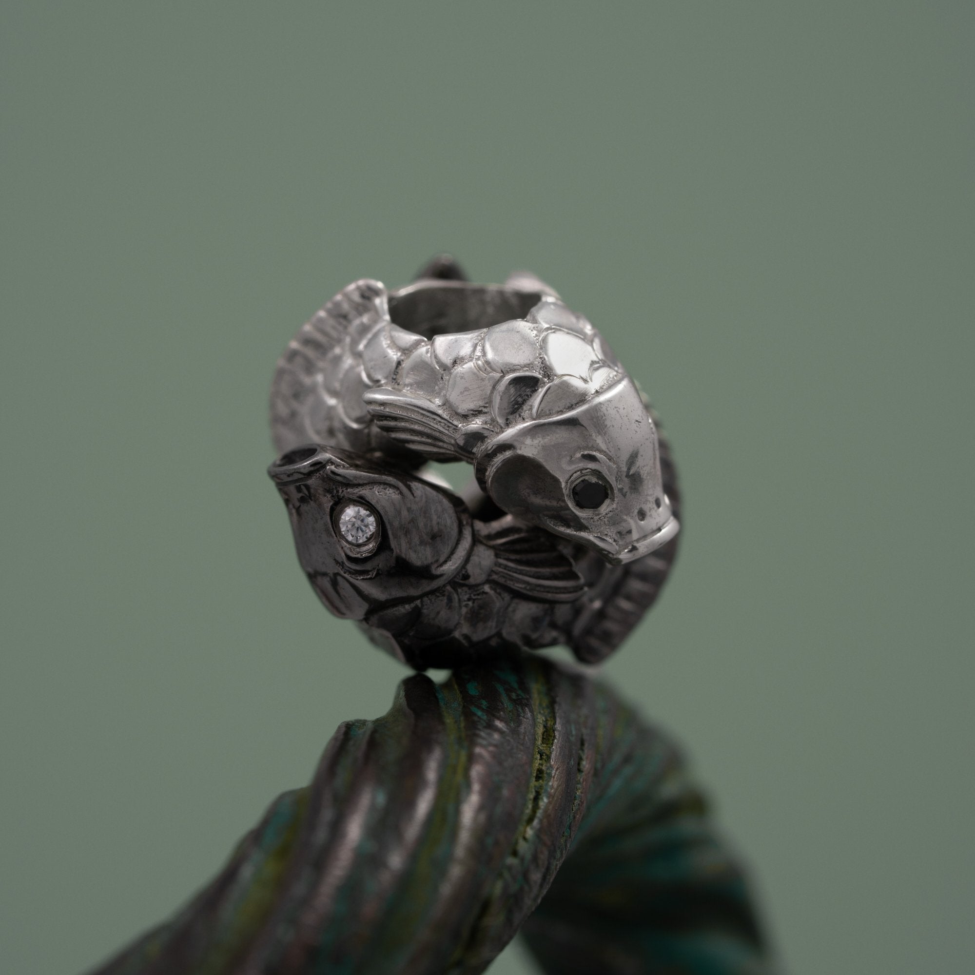 Double Bead "Dancing fishes" with cubic zirconia eyes