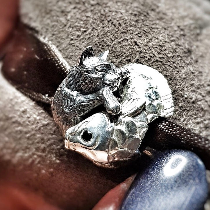 Double Bead "Dancing fishes" with cubic zirconia eyes