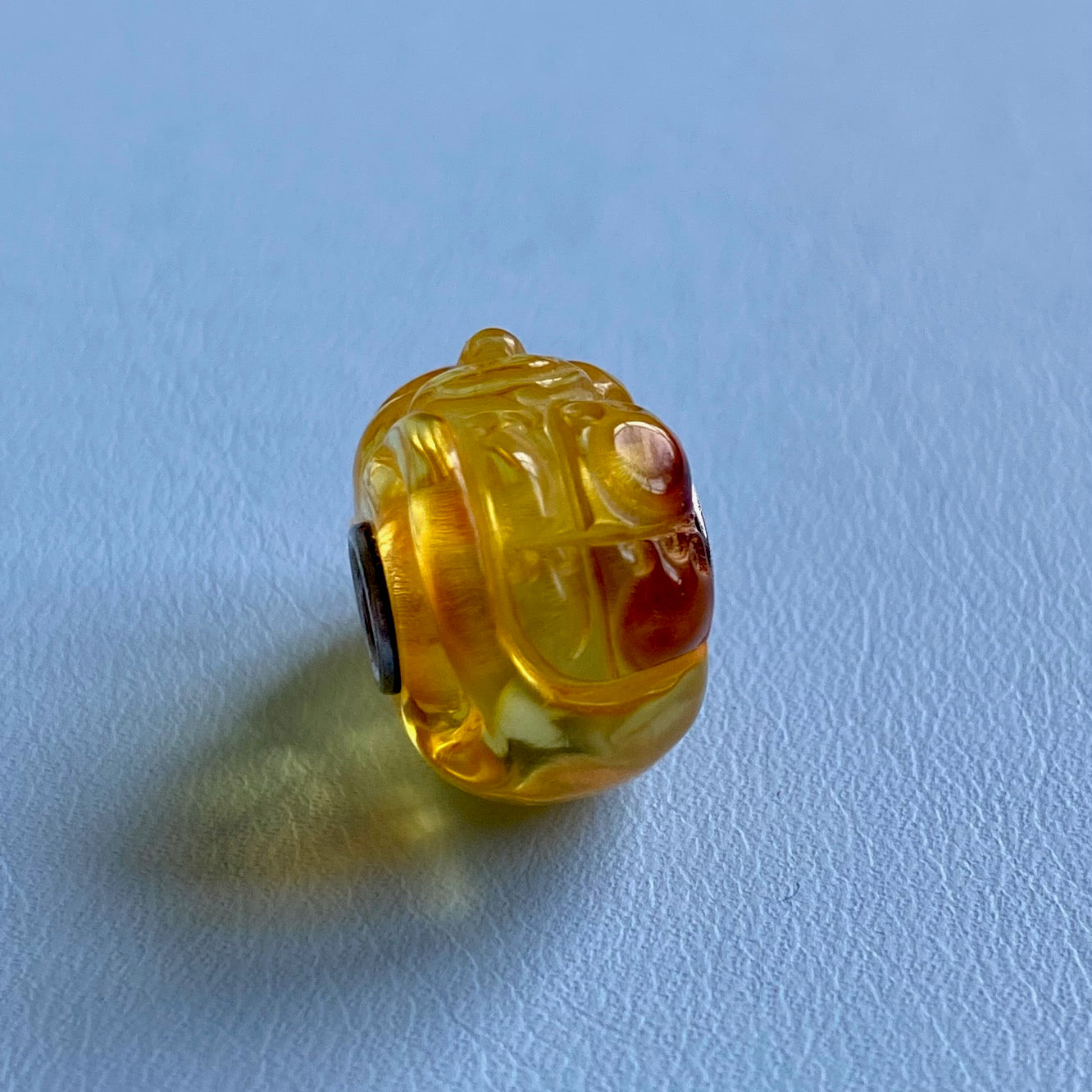 Carved Amber Triceratops