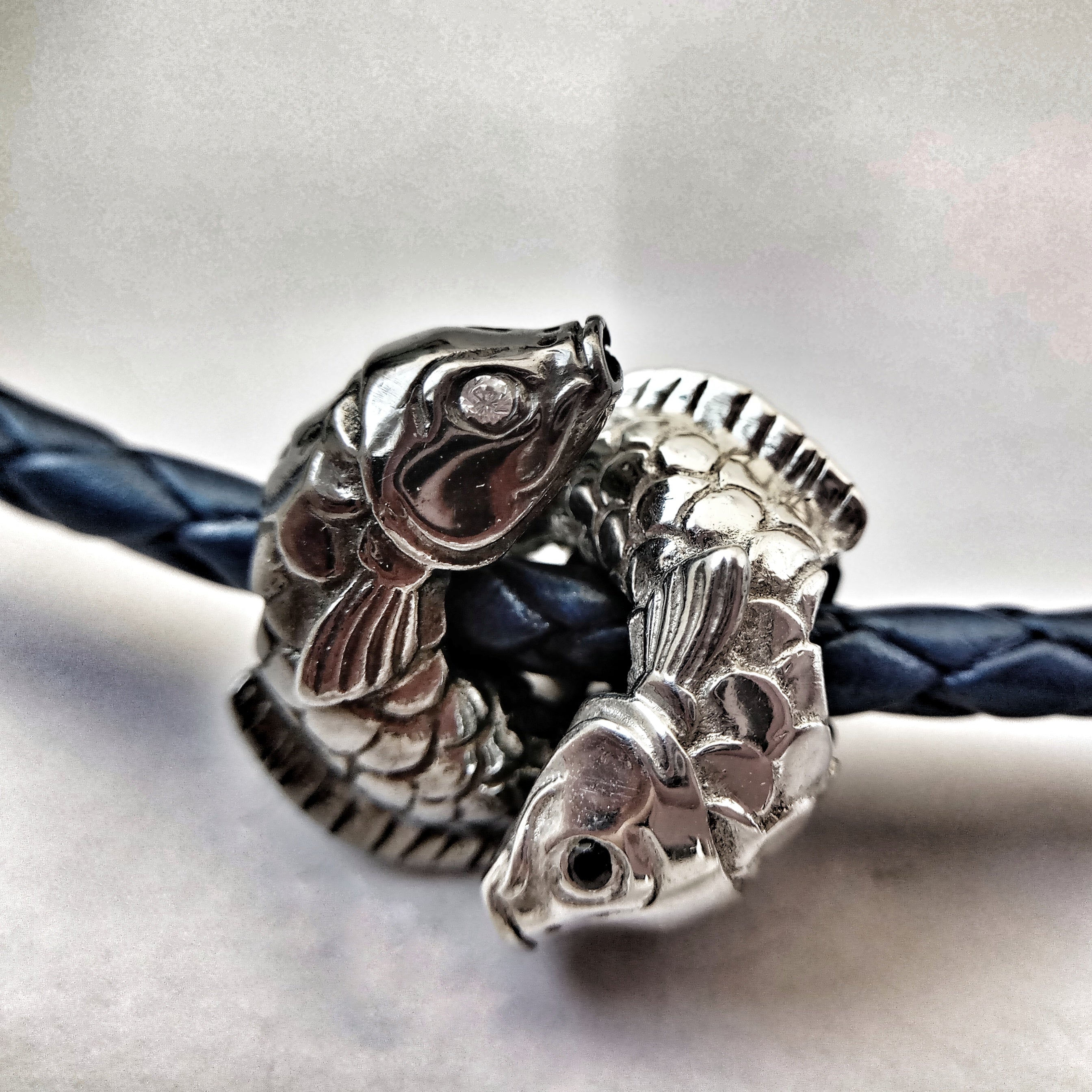 Double Bead "Dancing fishes" with cubic zirconia eyes