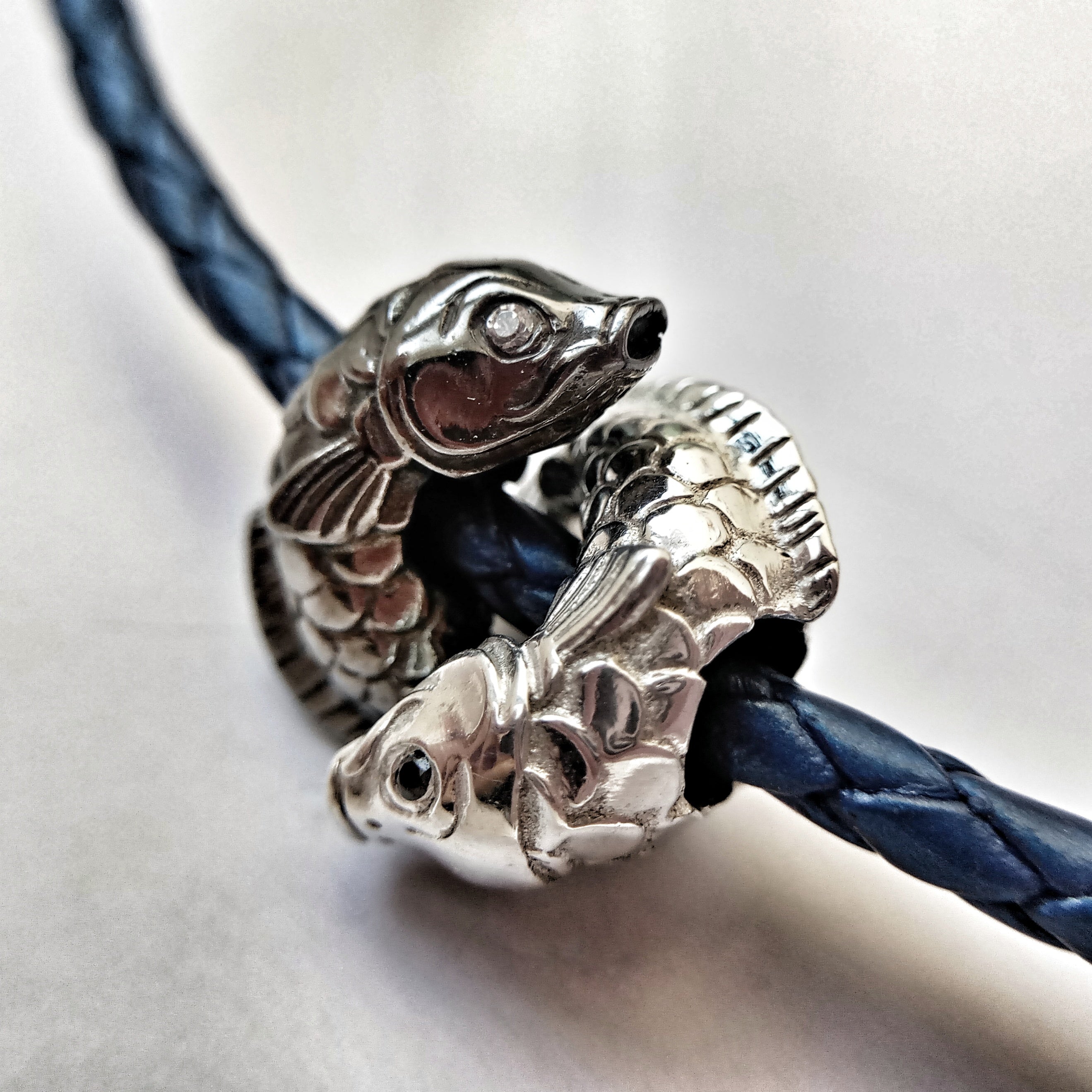 Double Bead "Dancing fishes" with cubic zirconia eyes