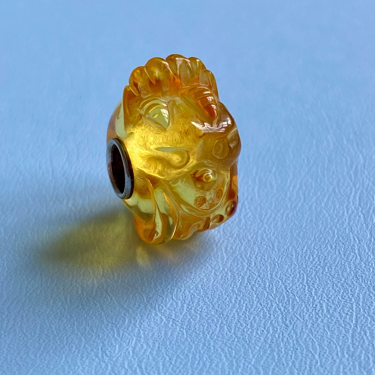 Carved Amber Triceratops