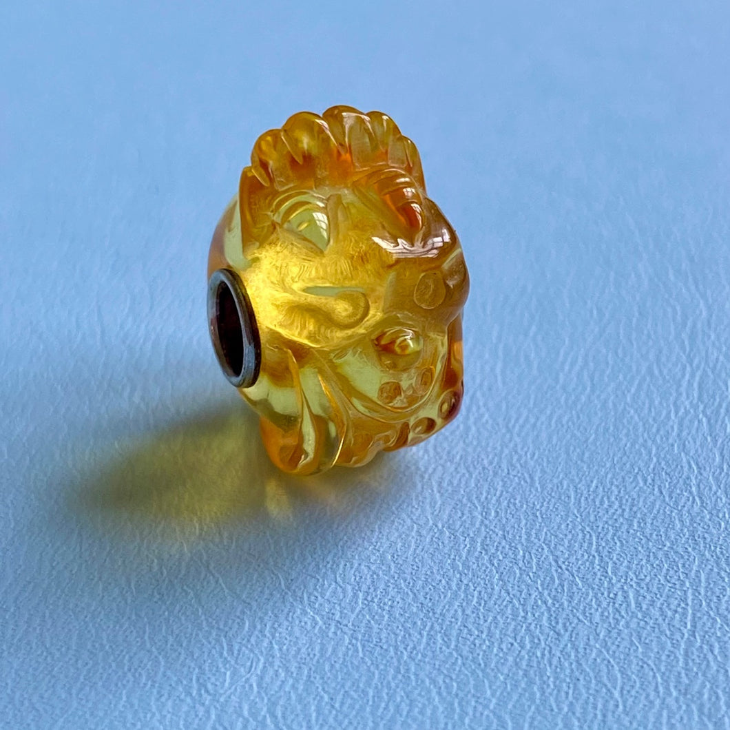 Carved Amber Triceratops